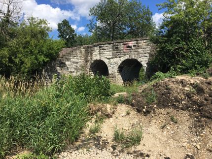 The old stone bridge and construction