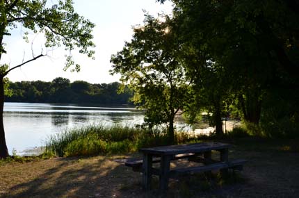 Skokie Lagoon and picnic table at sunset