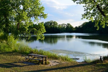 Picnic table and Skokie Lagoon lake.