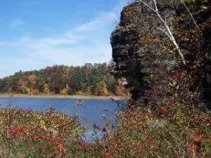 A view of a rock formation and lake along the 400 State Trail